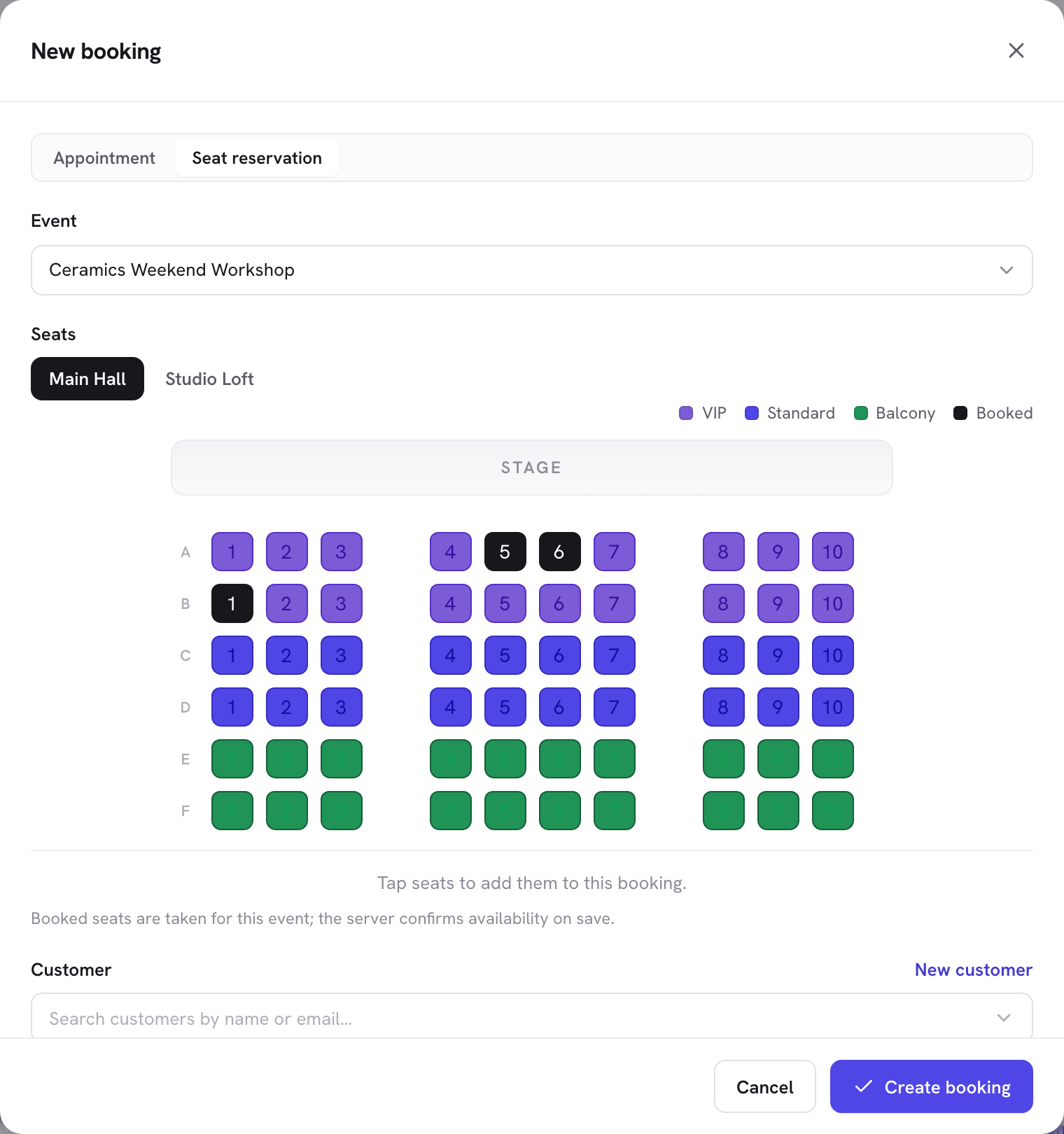 The New booking dialog on its Seat reservation tab: an event picker and the seat map with seats selected